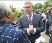  ?? Ernest A. Brown/The Call ?? Cape Verde President Jorge Carlos Fonseca, facing, visited Pawtucket on Saturday, with Mayor Donald Grebien hosting a reception at 10 Rocks Restaurant, where a sign was unveiled on Main Street, renamed ‘Cabo Verde Way.’ The President spoke to a packed...