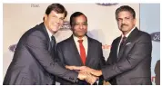  ?? PHOTO: PTI ?? Jim Farley, president of Ford’s new businesses, with M&M MD Pawan Goenka and Mahindra Group Chairman Anand Mahindra at a news conference in Mumbai on Tuesday