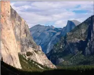  ?? AP PHOTO BY TAMMY WEBBER ?? This Oct. 2, 2013, photo shows a view seen on the way to Glacier Point trail in the Yosemite National Park. The National Park Service is floating a proposal to increase entrance fees at 17 of its most popular sites next year.