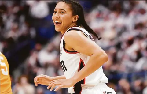  ?? Jessica Hill / Associated Press ?? UConn’s Azzi Fudd during a game against Tennessee on Feb. 6. Fudd’s parents helped her navigate her freshman season, which included injuries, adversity and a Final Four appearance.