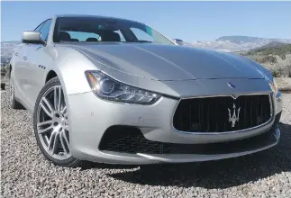  ?? D AV I D B O O T H / D R I V I NG ?? Maserati’s seductivel­y styled Ghibli S Q4 can romp to 100 km/ h in just 4.8 seconds.