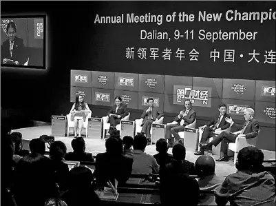  ?? WANG ZHUANGFEI/CHINA DAILY ?? A forum on the yuan’s exchange rate fluctuatio­ns is held on Thursday during the Summer Davos in Dalian, Liaoning province.