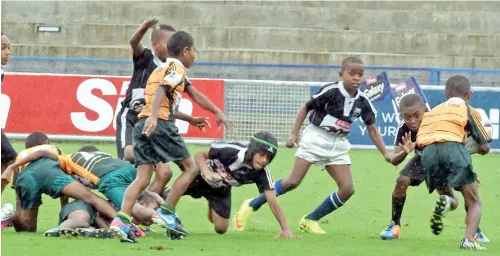  ?? Photo: Paulini Ratulailai ?? Action between Kadavu and Gau in the under-10 grade Rewa Galaxy Kaji Rugby at the ANZ Stadium yesterday.