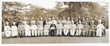  ??  ?? Tunku Abdul Halim (standing 13th left) is seen behind his father Sultan Badlishah in this group photo taken on Aug 5, 1957.