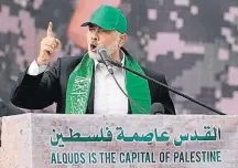  ?? MOHAMMED SABER/EFE ?? Gaza. Ismail Haniye, líder do Hamas, incita partidário­s