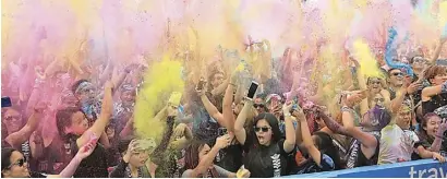  ??  ?? Rainbow descends Thousands of health buffs join the Color Manila Run which is now on its seventh year. Filipinos have become more conscious about fitness and healthy eating.