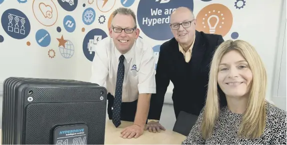  ??  ?? Hyperdrive CEO Chris Pennison, left, with Neil Dwyer and Sarah Hall of Hay & Kilner.