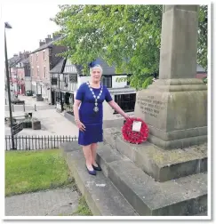  ??  ?? Leek Town Mayor Councillor Sue Coleman laying a wreath at the Nicholson War Memorial in Leek