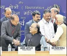  ?? PTI ?? Finance minister Arun Jaitley greets Himachal Pradesh chief minister Jai Ram Thakur during a prebudget meeting in New Delhi on Thursday. Tamil Nadu deputy CM O Panneersel­vam and MOS finance Shiv Pratap Shukla also attended the meeting