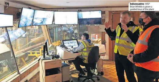  ?? ?? Informativ­e MSP BrianWhitt­le is given a guided tour of the plant