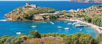 ?? ?? SO ALLURING: Girolata Bay in Corsica – there are decent deals to be had to the French island in July