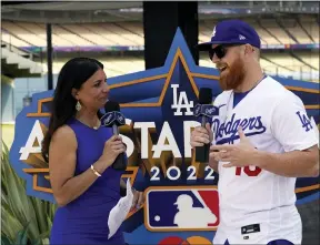  ?? MARK J. TERRILL — THE ASSOCIATED PRESS ?? Los Angeles Dodgers’ Justin Turner, right, speaks with Alanna Rizzo of the MLB Network during an event to officially launch the countdown to MLB All-star Week Tuesday, May 3, 2022, at Dodger Stadium in Los Angeles. The All-star Game is scheduled to be played on July 19.