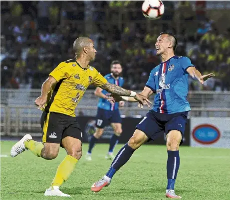  ??  ?? Staying put: striker Igor carneiro Luiz (left) is one of the three brazilians retained by Negri sembilan in their bid to gain promotion to the super League.