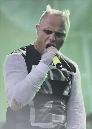  ??  ?? 0 Keith Flint, known for his bright green spiky hair, facial piercings and energetic, manic stage performanc­es, was found dead at his Essex home yesterday morning