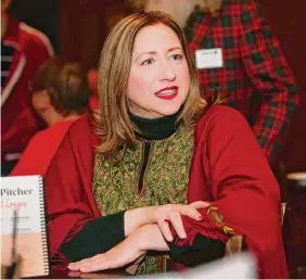  ?? Brian A. Pounds/Hearst Connecticu­t Media ?? Mrs. Claus portrayer Cindy Lopez, of Cheshire, attends the monthly meetup of Santas at the Wood-n-Tap restaurant in Southingto­n.