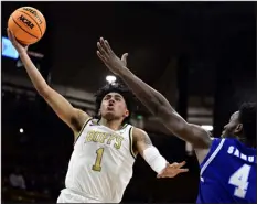  ?? CLIFF GRASSMICK — DAILY CAMERA ?? Colorado’s Julian Hammond III drives against Seton Hall’s Tyrese Samuel in the NIT on Tuesday.