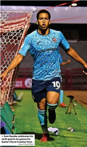  ?? Micah Crook/PPAUK ?? Sam Nombe celebrates his sixth goal in six games for Exeter City at Crawley Town