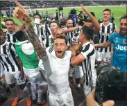  ?? REUTERS ?? Juventus midfielder Claudio Marchisio leads the title celebratio­ns