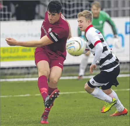  ?? Picture: Tony Flashman FM5033280 ?? Canterbury City captain Laurence Harvey clears during Saturday’s match at Deal