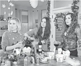  ??  ?? Kristen Bell, Mila Kunis and Kathryn Hahn are back to turn the holidays upside down in A Bad Moms Christmas. PHOTOS BY HILARY BRONWYN GAYLE/STX ENTERTAINM­ENT