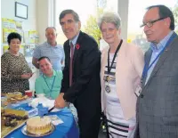  ??  ?? From left: MP David Rutley, Councillor Liz Durham and Phil Spring, trustee of East Cheshire Eye Society