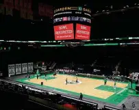  ?? Maddie Meyer / Getty Images ?? The Celtics, who flew to San Antonio on Tuesday hoping they will still play tonight, had endured postponed games — like this one against the Heat on Jan. 10 — well before the Spurs.