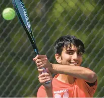  ?? APRIL GAMIZ/THE MORNING CALL ?? Moravian Academy’s Aveer Chadha hits the ball in a match against Allentown Central Catholic last season. Chadha won at second singles Tuesday in a match against Saucon Valley.