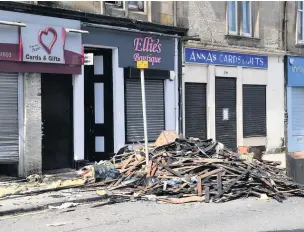  ??  ?? Rubble trouble
The aftermath of the blaze in Union Street