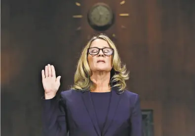  ?? Win McNamee / getty images ?? Palo Alto University Professor Christine Blasey Ford is sworn in before testifying in front of the Senate Judiciary Committee. Ford says she was sexually assaulted by Brett Kavanaugh as a teen 36 years ago.