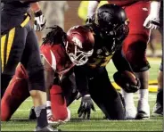  ?? NWA Media/MICHAEL WOODS ?? Arkansas running back Alex Collins gets up after losing a fumble to Missouri defender Markus Golden in the fourth quarter of Friday’s game at Faurot Field in Columbia, Mo. The 17th-ranked Tigers ran out the clock after the play to secure the victory....