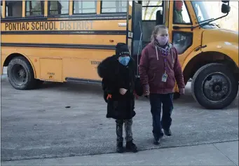  ?? MEDIANEWS GROUP FILE PHOTO ?? Students arrive for class on Feb. 3at Walt Whitman Elementary in Pontiac.