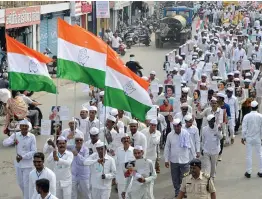  ?? — PTI ?? Congress workers at a rally on the occasion of the birth centenary of the nation’s first woman Prime Minister Indira Gandhi in Jabalpur on Saturday.