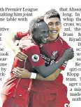  ??  ?? Hit men: Liverpool scorers Sadio Mane and Roberto Firmino