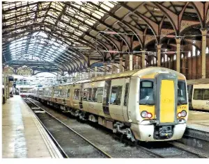  ?? RICHARD CLINNICK. ?? Class 379 Electrosta­rs introduced in 2011 for the Stansted Express and West Anglia routes will be replaced in 2019. On February 14 2013, 379014 (left) and 379008 stand at London Liverpool Street with trains for Stansted.