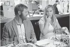 ?? MARK SCHAFER/STX FILMS ?? Ethan (Rory Scovel) is impressed by the newfound confidence in Renee (Amy Schumer) in “I Feel Pretty.”