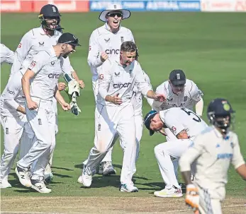  ?? ?? HYDERABAD HISTORY: England celebrate during their memorable Test victory over India, but nearby local batsman Tanmay Agarwal came close to breaking Brian Lara’s record individual score of 501.