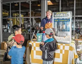  ?? KELSEY MCCLELLAN FOR THE WASHINGTON POST ?? A former technical lead at Square, Jerry Haagsma serves his popcorn, Jerrypop, at an event at Harmonic Brewing in San Francisco.