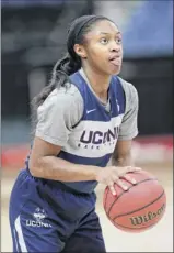  ?? John Raoux / Associated Press ?? Oconn’s Crystal Dangerfiel­d shoots at practice at the Final Four. The Huskies are 1-3 vs. Notre Dame in national semis.