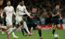  ?? Tom Jenkins/The Guardian ?? Phil Foden, a lively presence all evening, drives at the Tottenham defence. Photograph: