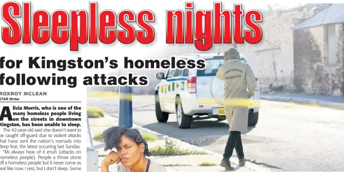  ?? FILE ?? Police investigat­ors process the scene of the murder of three homeless men outside the Kingston and St Andrew Parish Court ( Civil Division) on Sutton Street, Kingston, in January.