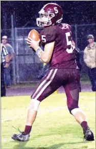  ?? Westside Eagle Observer/MIKE ECKELS ?? Gentry quarterbac­k Brandon Atwood looks downfield for his receivers late in the third quarter of the GentryPea Ridge conference football contest.