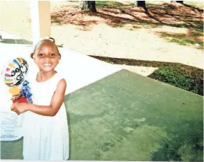  ?? KELAND NANCE ?? Jermeisha Nance on her kindergart­en graduation day. Her family remembers her as a funny and happy child who had aspiration­s to be a teacher and a lawyer.