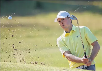  ?? AP PHOTO ?? Jordan Spieth hits a shot out of a bunker on the fourth green during Tuesday’s practice round ahead of the British Open Golf Championsh­ip at Royal Birkdale, Southport, England.