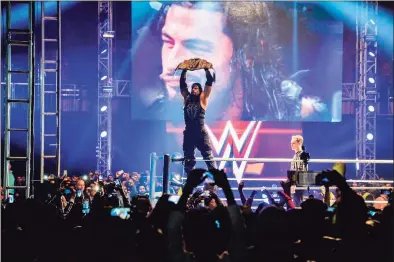  ?? Chandan Khanna / AFP via Getty Images ?? WWE's Friday Night SmackDown Live is making its long-awaited return to the Mohegan Sun Arena.