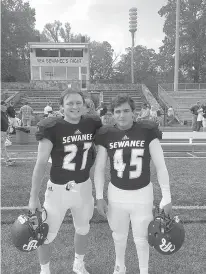  ?? Submitted photo ?? Freshman safety Charlie Trammell with teammate John Cleveland, a senior defensive back at the University of the South. Trammell was born with bilateral clubfoot and, from an early age, required multiple surgeries to be able to walk and run.