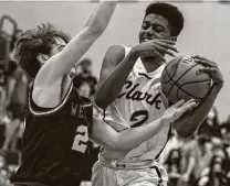  ?? William Luther / Staff photograph­er ?? Clark senior Dalen Whitlock, right, finished with five points in Friday’s Class 6A Region IV championsh­ip game.