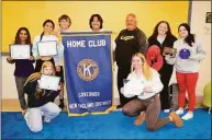  ?? Contribute­d photo ?? Jonathan Law Key Club members show the awards they brought home from the recent New England District Convention held in Springfiel­d, Mass. From left are Skylar Johnson, Grace Baird (rear) Diya Daruka, Maya Rosado, Ben Rossi, Kyle Chy, Ted Boynton (club faculty advisor), Caroline Doyle and Hanna Keating.