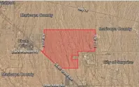  ?? CITY OF SURPRISE ?? An aerial map shows the land railroad giant BNSF is requesting to be changed from residentia­l to employment.