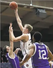  ?? JEFF CHIU — ASSOCIATED PRESS ?? Saint Mary’s center Jock Landale shoots against UNC Asheville during the first half Friday game in Moraga.