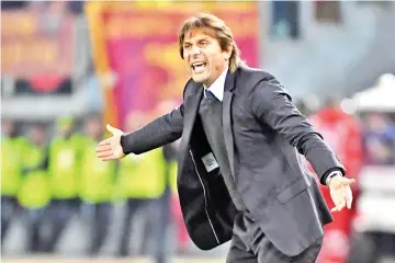  ?? — AFP photo ?? Chelsea's Italian head coach Antonio Conte reacts during the UEFA Champions League football match AS Roma vs Chelsea on October 31, 2017 at the Olympic Stadium in Rome.